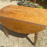 Wooden table on casters