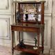 Bonheur du jour in mahogany and brass inlay, late 18th century