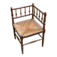 19th-century solid wood corner chair with red and blue rush seating.