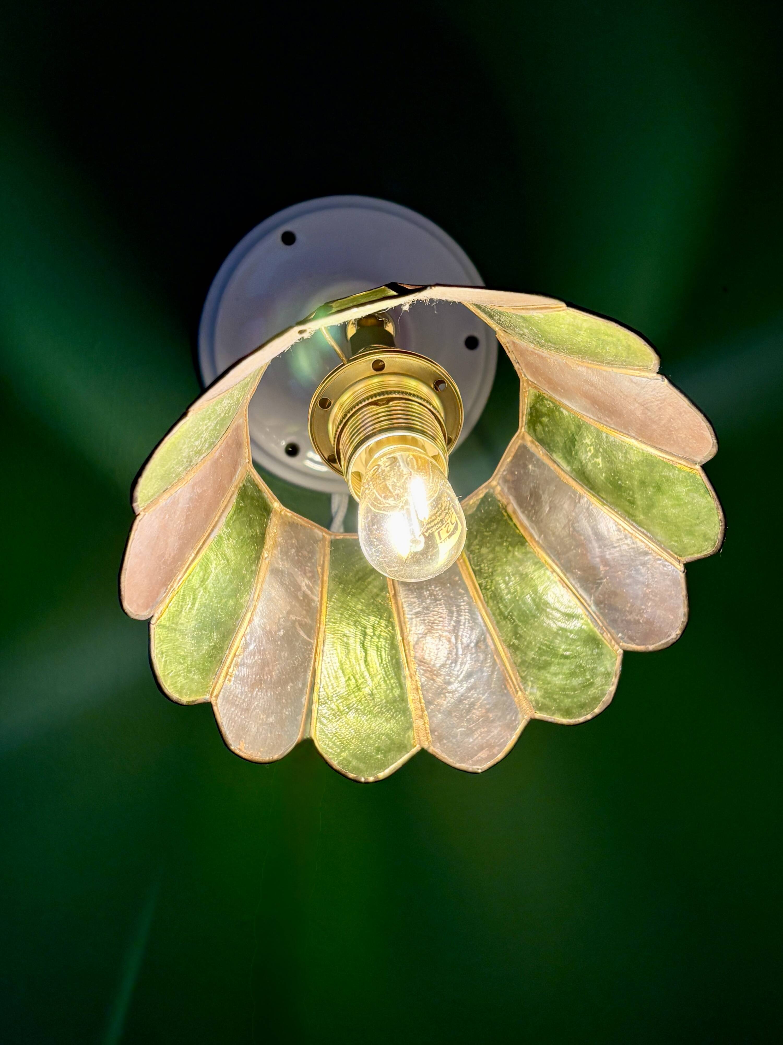 Vintage wall lamp with a green and pink mother-of-pearl lampshade