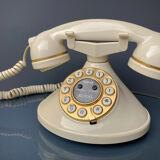 Téléphone à forme design écru et dorée