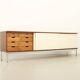 Sideboard of three sliding doors published by Airborne, France, 1960s.