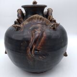 Antique Khmer ceramic vase. With elephant decoration.