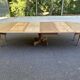 Round dining table with a central pedestal, stripped raw oak, 4 extensions, 19th century.
