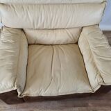 Fauteuil avec pouf en cuir et daim
