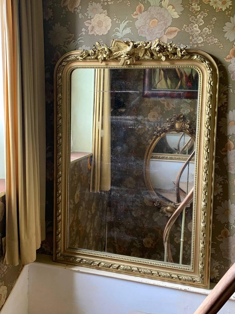 Gilded wood fireplace mirror with pediment, height 142