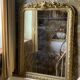 Miroir de cheminée en bois doré à fronton