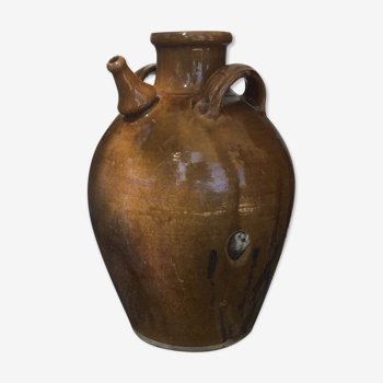 Varnished oil jug