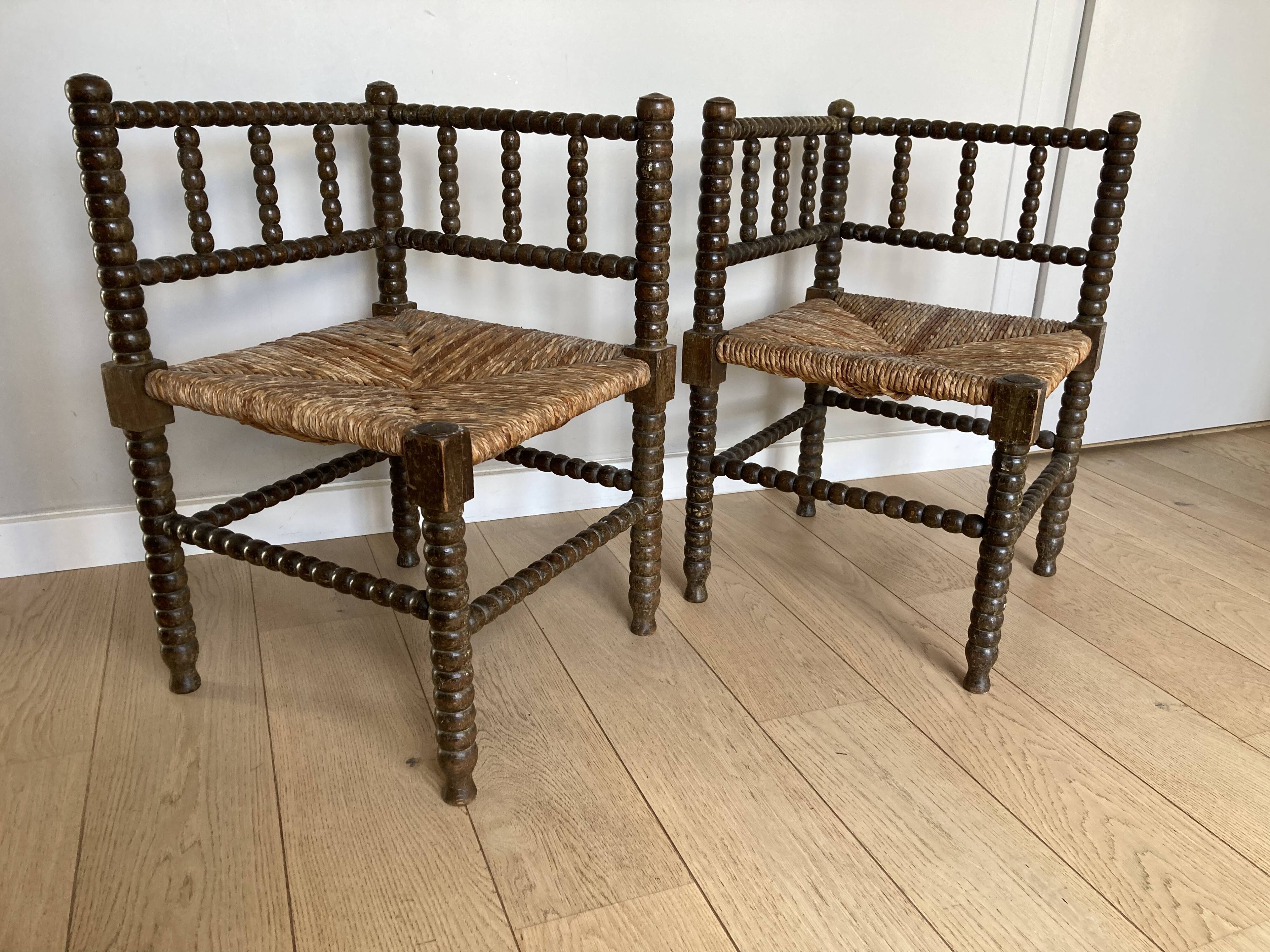 Turned wood corner armchairs