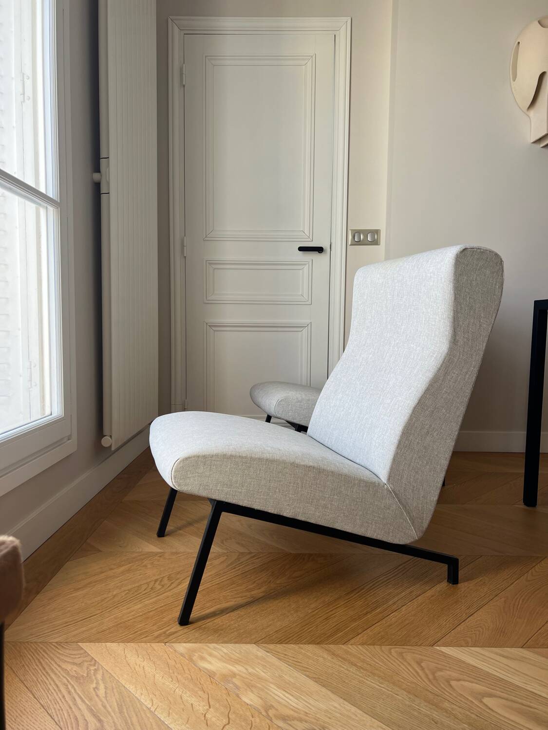 Pair of Pierre Guariche armchairs