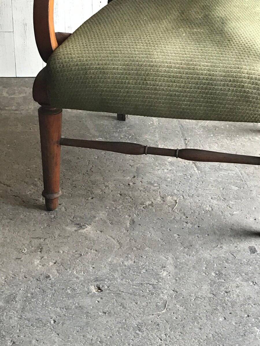 Biedermeier armchair in olive green fabric and carved wood, period 1890-1919.