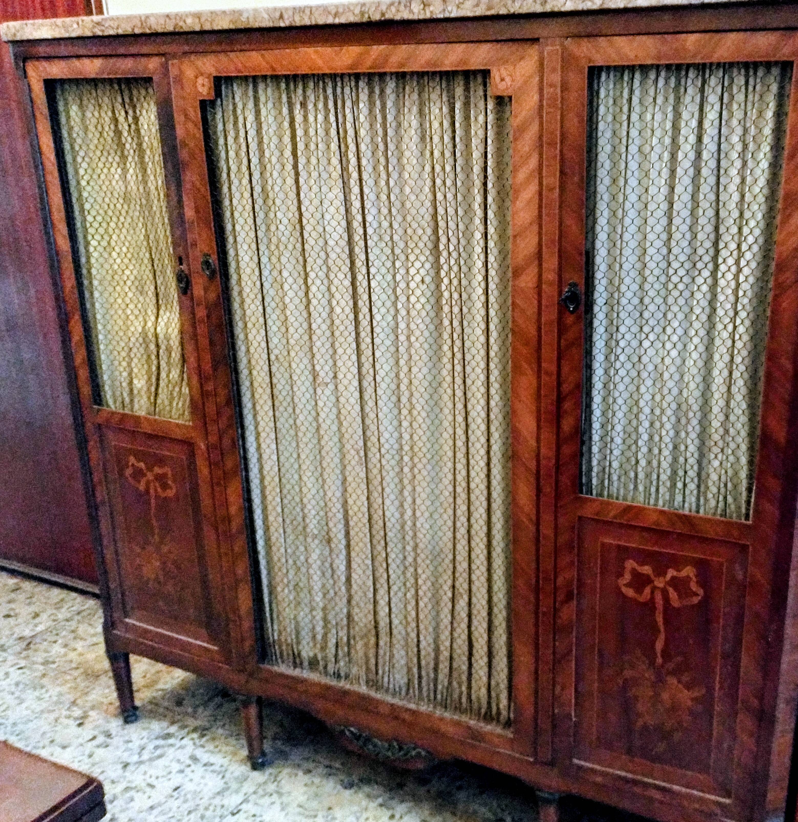 Antique wardrobe in Louis XVI style