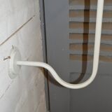 White patinated iron rotary coat holder