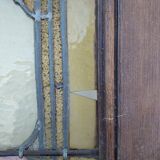 porte en chêne avec des vitraux