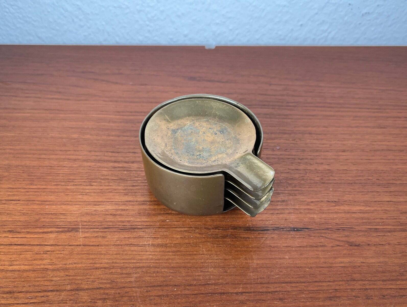 Stackable Austrian brass ashtrays in mid-century style, 1960, set of 5.
