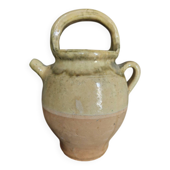 Yellow glazed terracotta gargoulette carafe with lid, early 20th century.