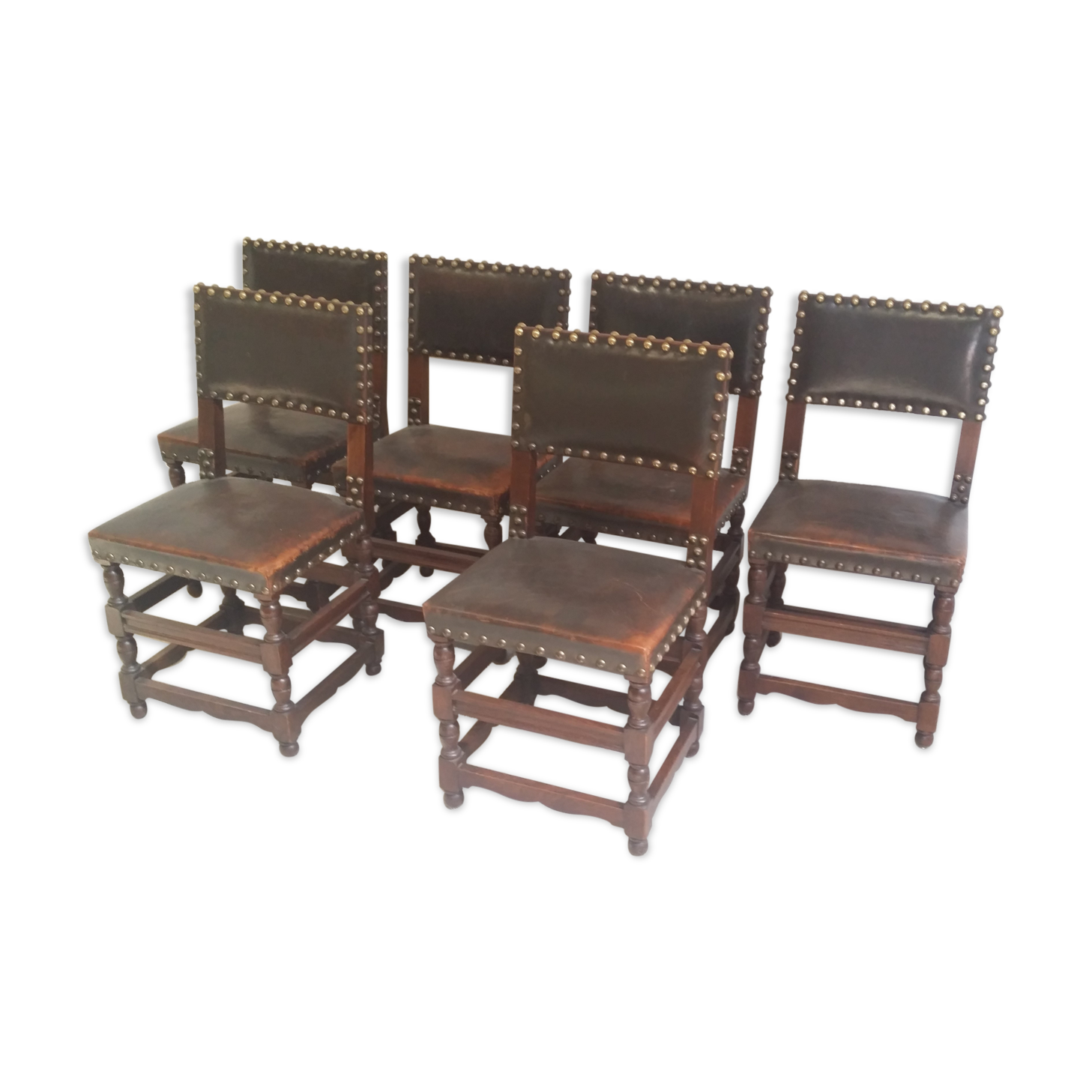 a set of six leather chairs and nails