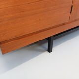 High Scandinavian modernist vintage sideboard in teak and black metal.