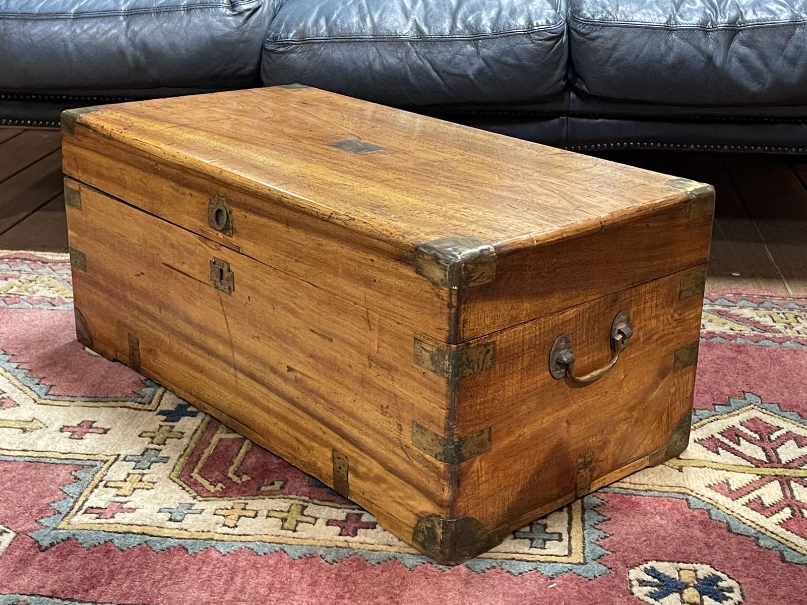 1930s English oak dressing table with beveled oval mirror