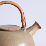 Sandstone teapot with rattan handle