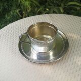 Cup with saucer