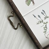 Old wooden plateau with floral tiles