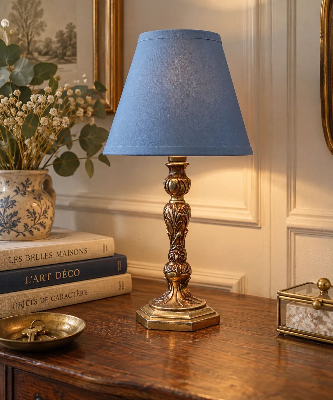 Vintage bedside lamp in gold metal – sculpted base and blue shade