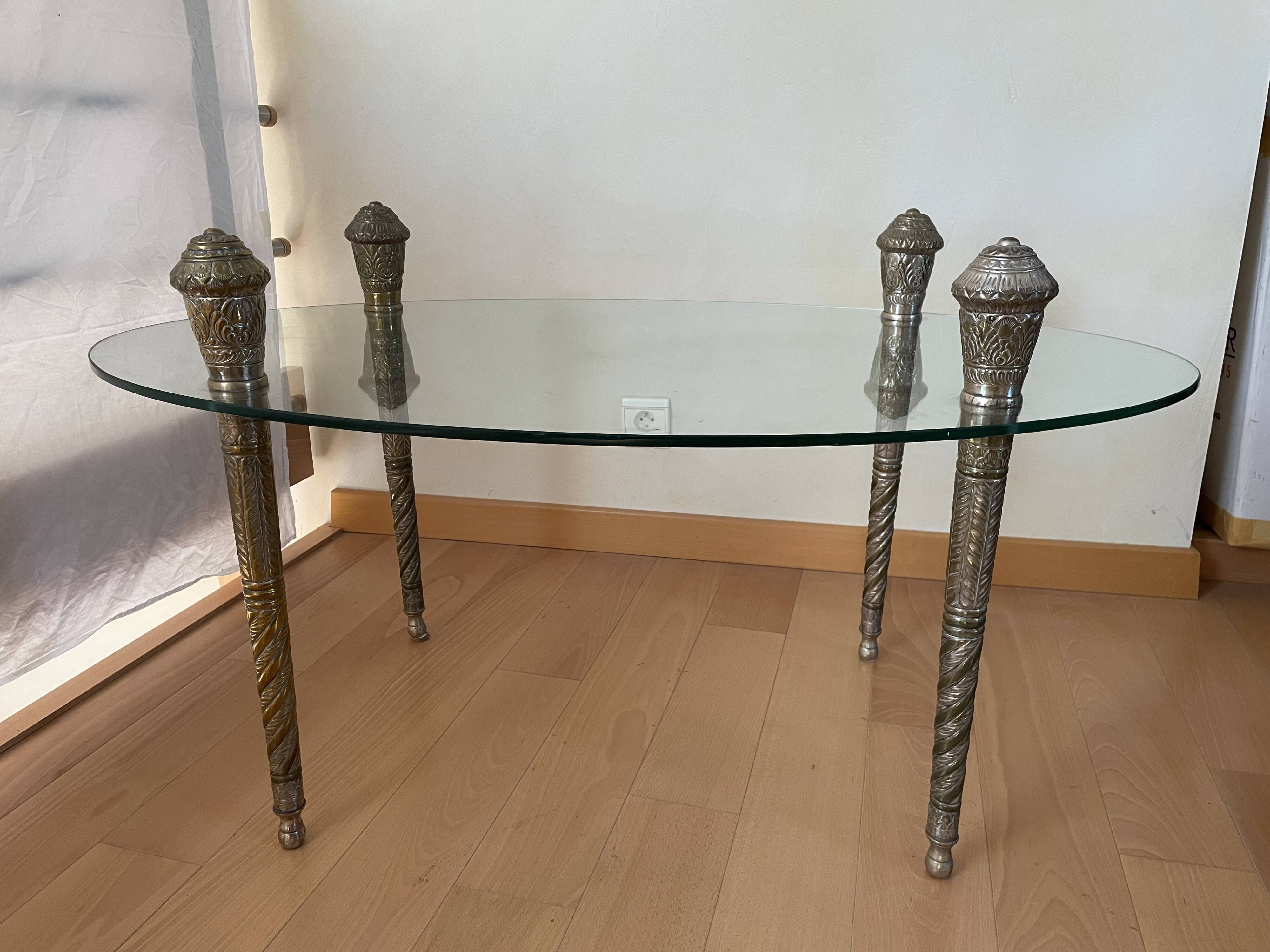 Glass coffee table with metal legs