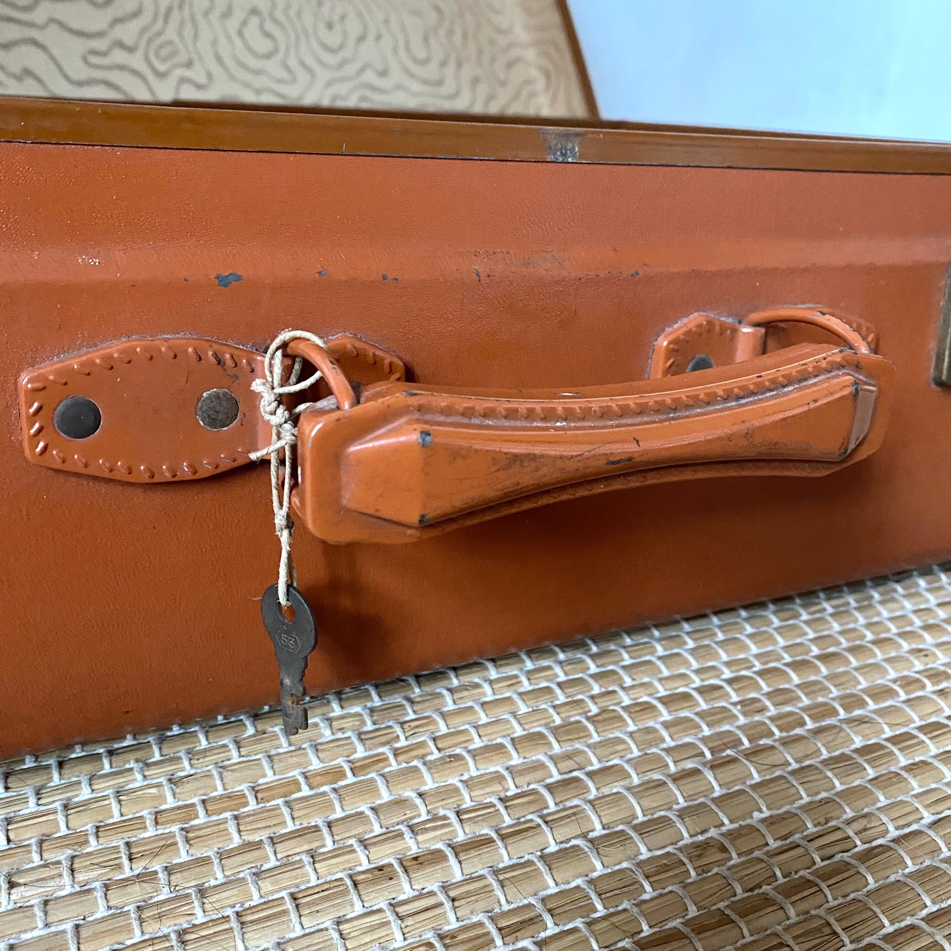 Antique suitcase and its key