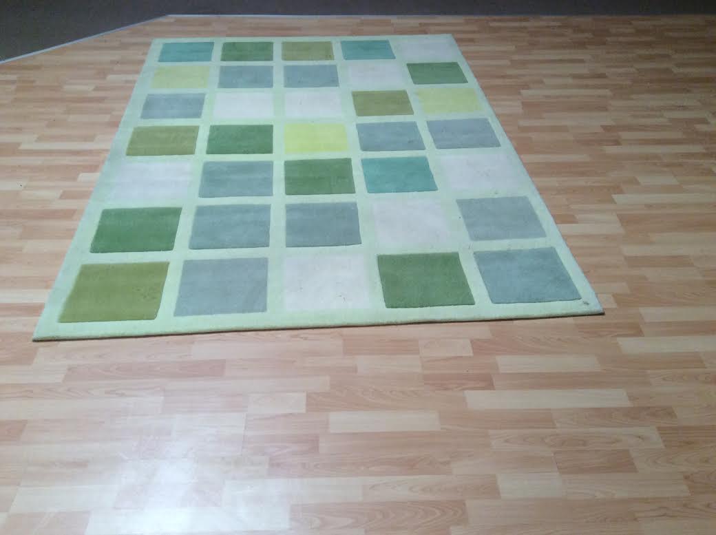 Green checkered wool carpet