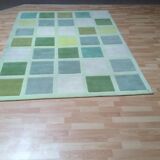 Green checkered wool carpet