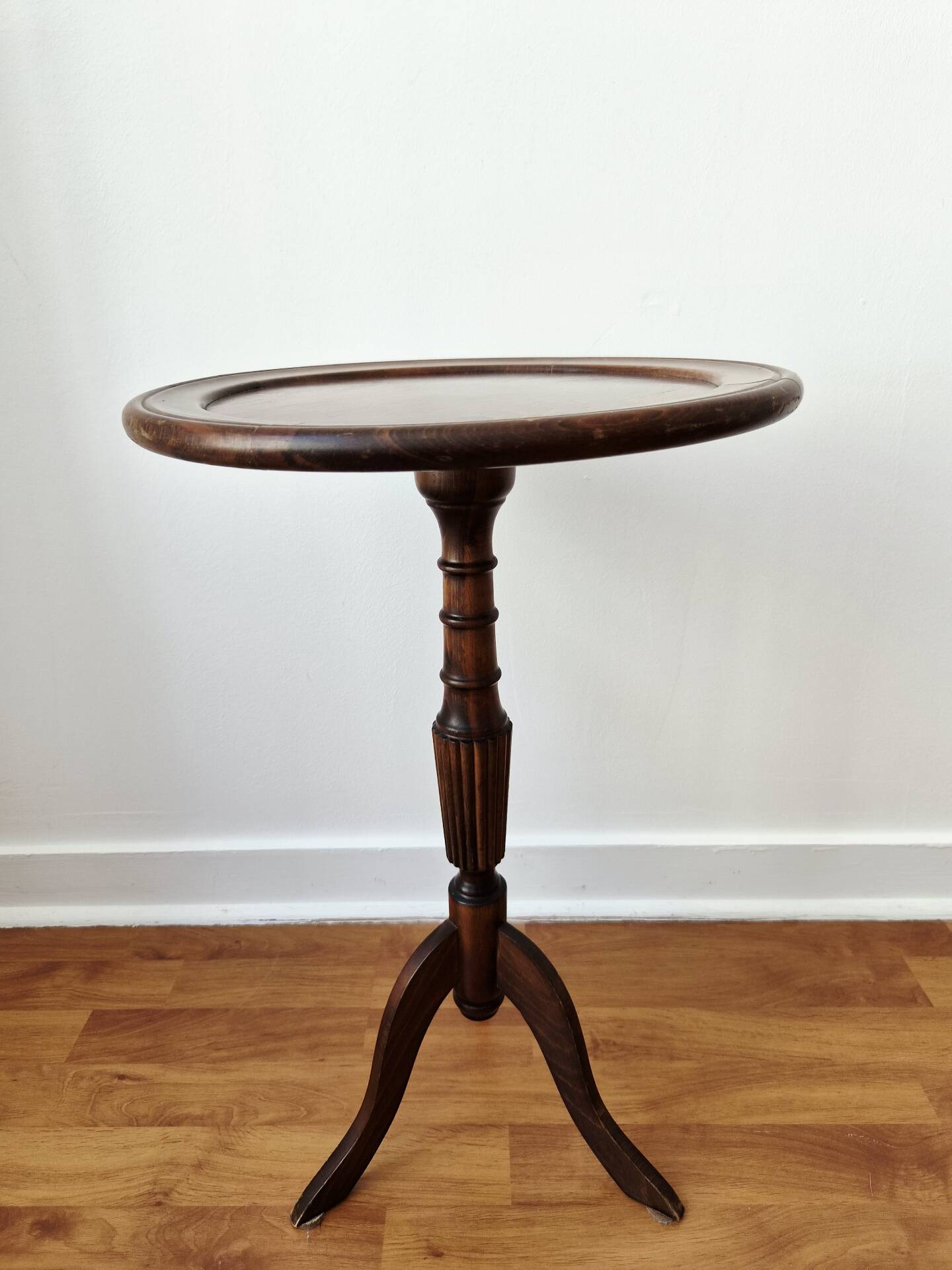 Small tripod wooden table with a vintage round top -