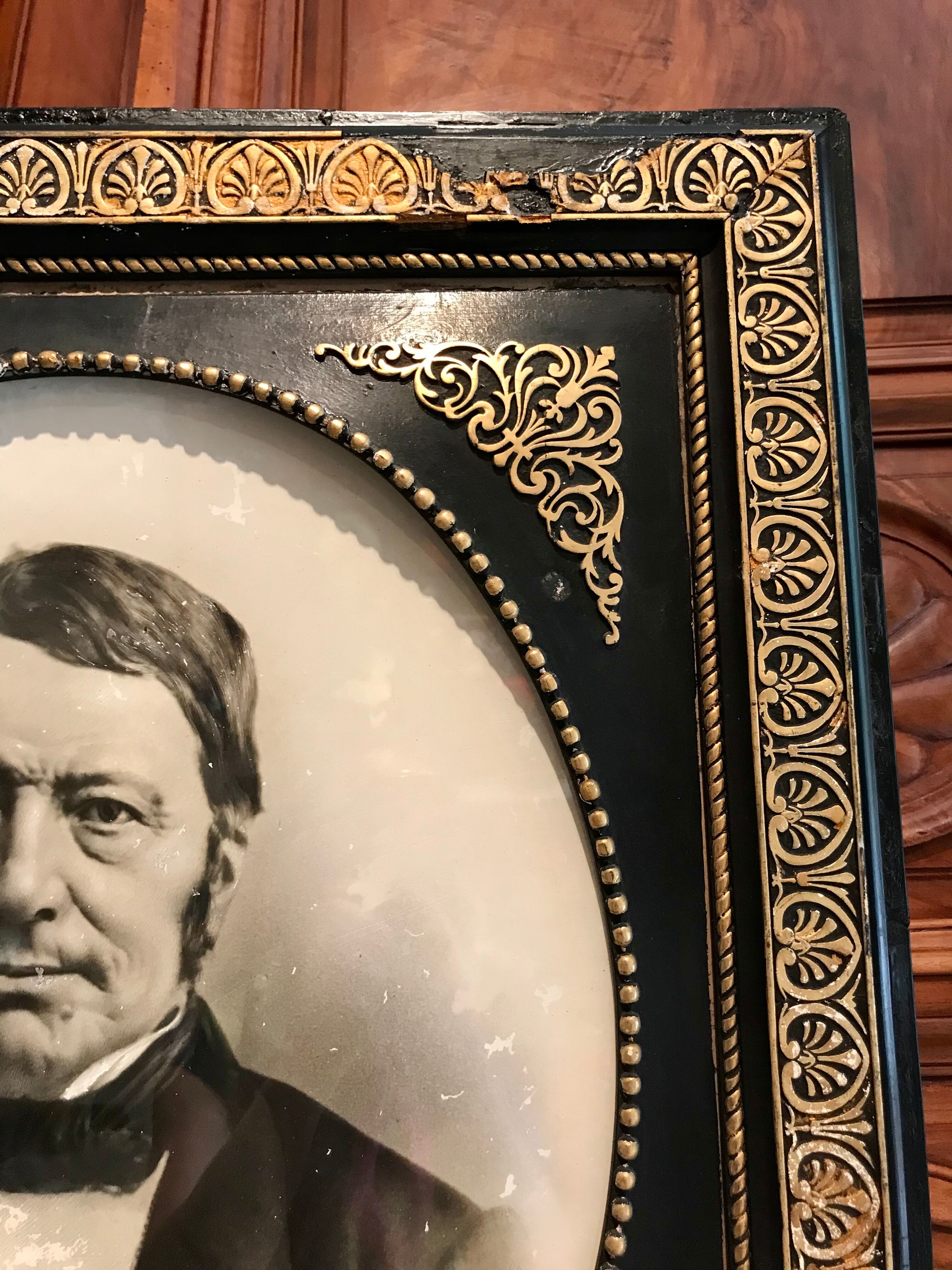 Black and gilded ebonite frame, wood and plaster 19th century