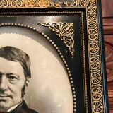 Black and gilded ebonite frame, wood and plaster 19th century