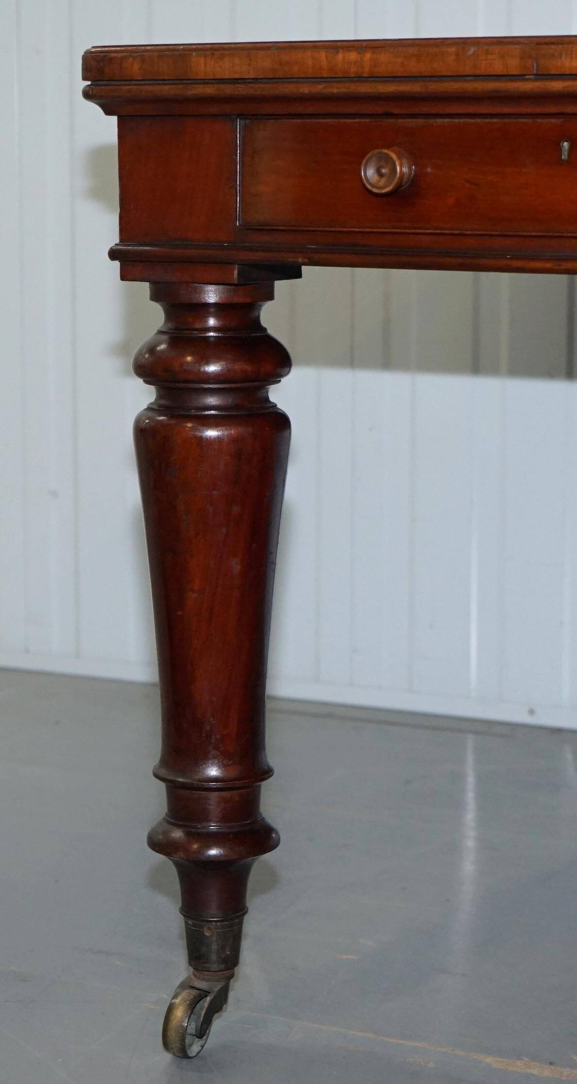 Rare double-sided desk in hardwood by Holland and Sons, Victorian era.