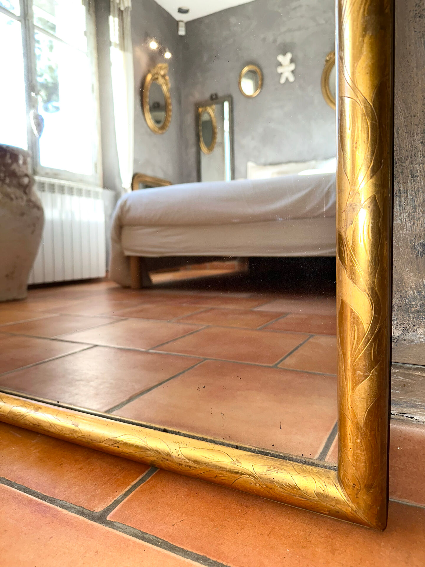 19th-century antique gilded mirror.