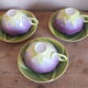3 purple cups, porcelain flowers Geneviève Lethu