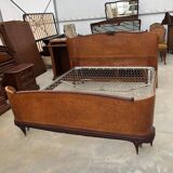 Brown lacquered wooden double bed frame in Mid-Century style from the 1940s.