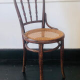 Pair of bistro chairs signed Thonet