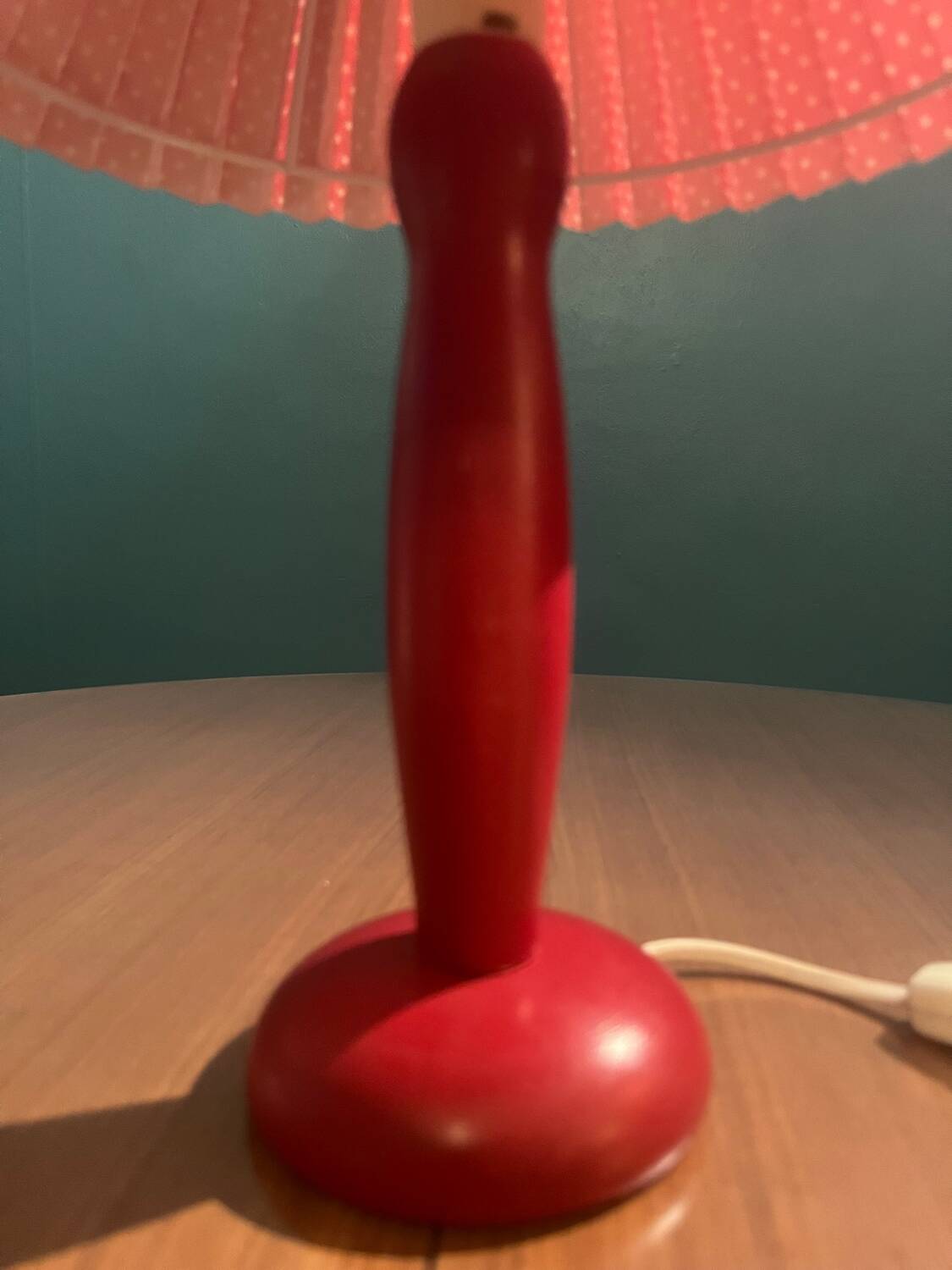 Wooden foot lamp with folded cardboard lampshade