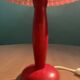 Wooden foot lamp with folded cardboard lampshade