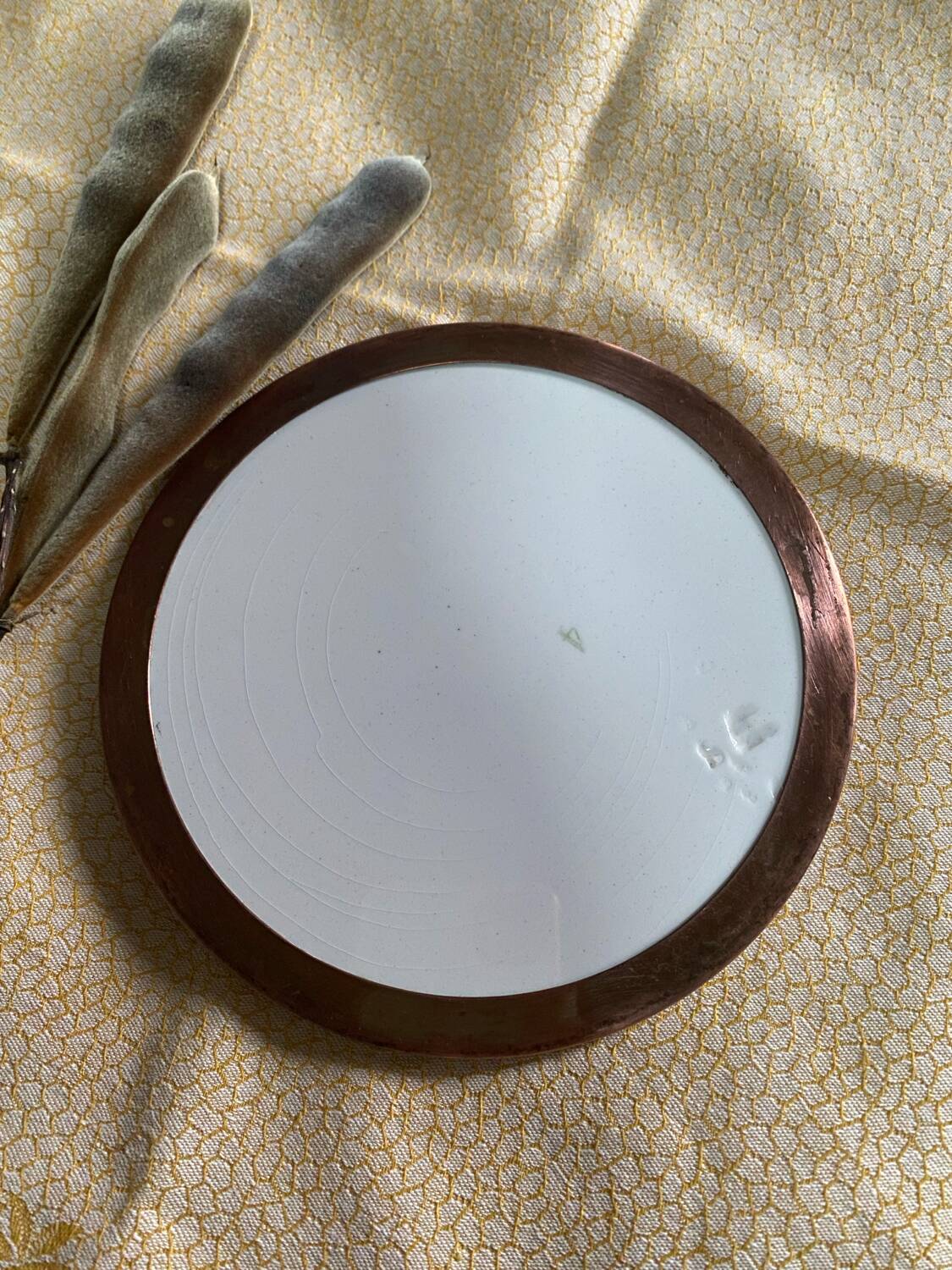 Ancient ceramic platter and bottle coaster