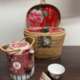 Chinese porcelain tea set in its portable wicker basket