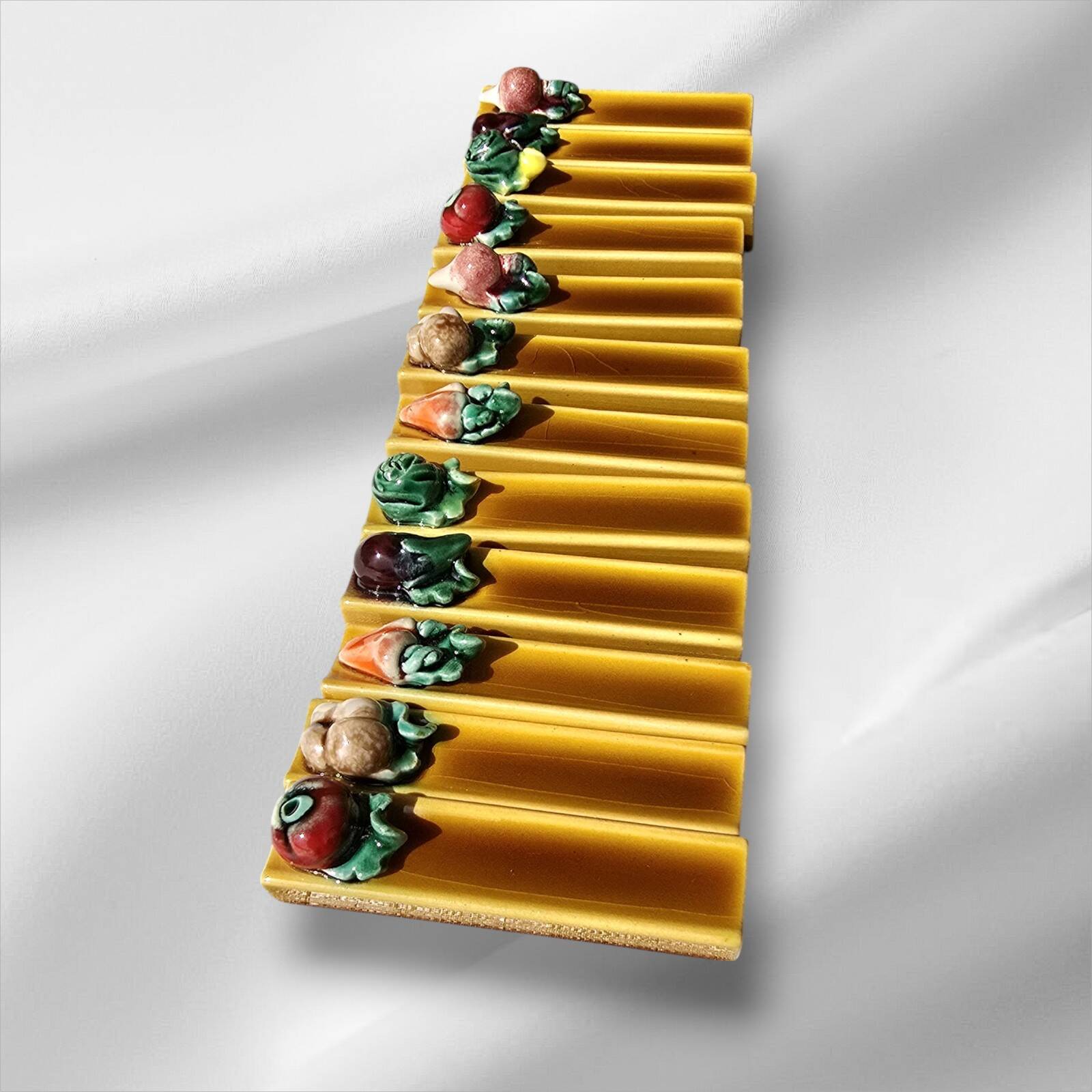 Set of twelve Vallauris majolica vegetable knife holders, 1950