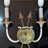 Pair of bronze arrow sconces