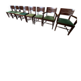 Set of 6 chairs and 2 armchairs by Gaston Poisson