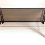 Magazine holder coffee table 1960s smoked glass, metal and brass Width 94.2 cm