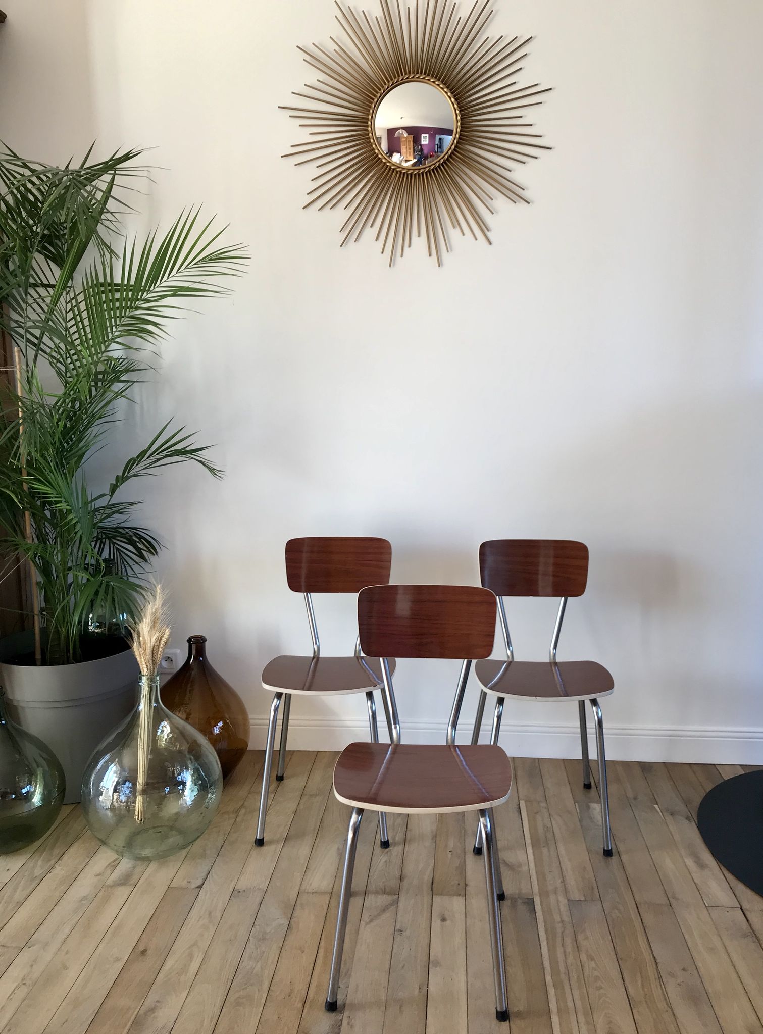 Trio of chairs in light brown formica and cream contour 70s