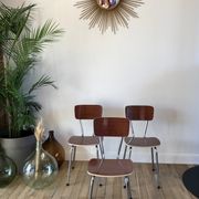 Trio of chairs in light brown formica and cream contour 70s