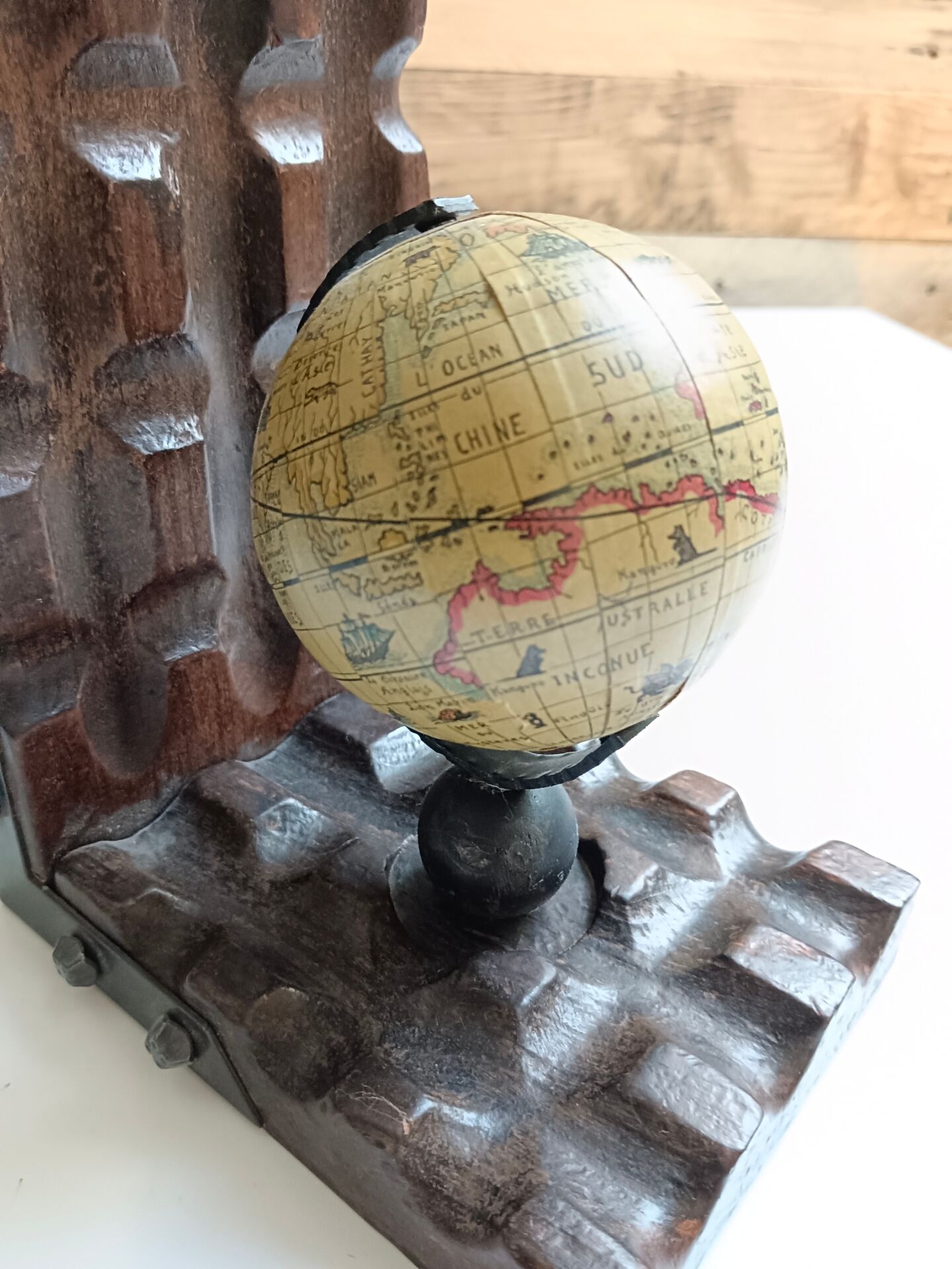 Wooden bookends globe world map